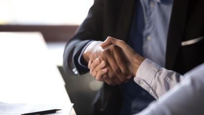 Colleagues shaking hands