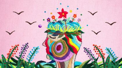 Surreal collage of a head with flowers growing out of it