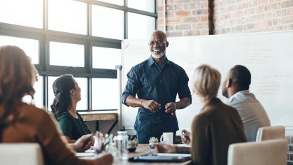 Man presenting to colleagues