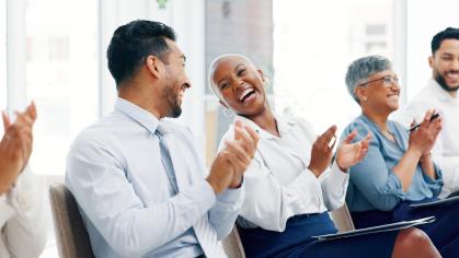 Colleagues laughing together